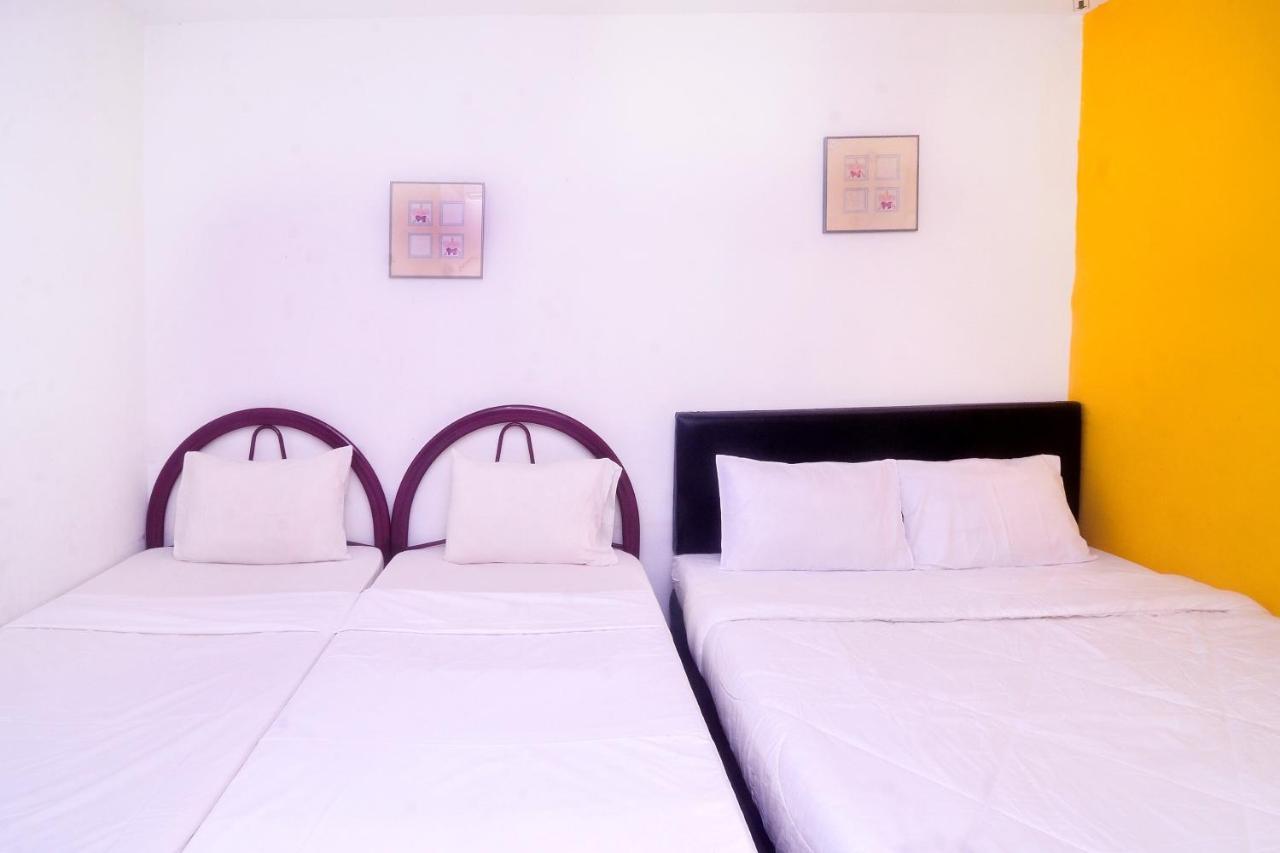 Spot On 89886 Backpacker'S Stay Services Кучинг Екстериор снимка